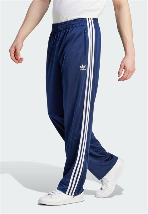 afkledende trainingsbroek adidas zalando dames|adicolor classics firebird trainingsbroek.